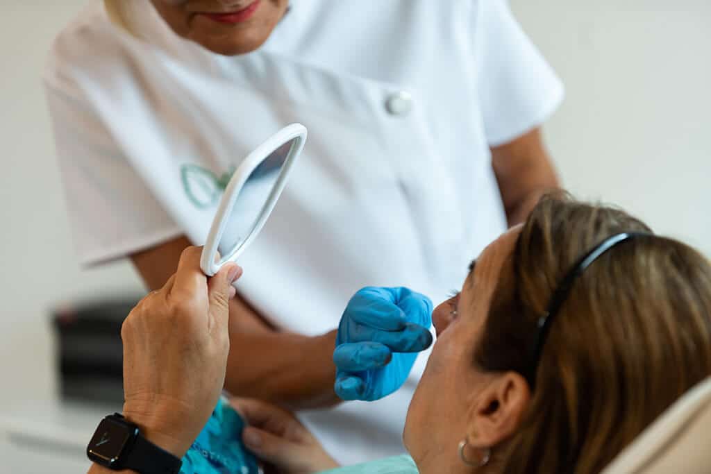 showing patient the results of Profhilo
